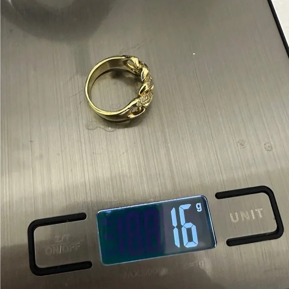 14K dimond and baguettes man ring (size 8) 16grams